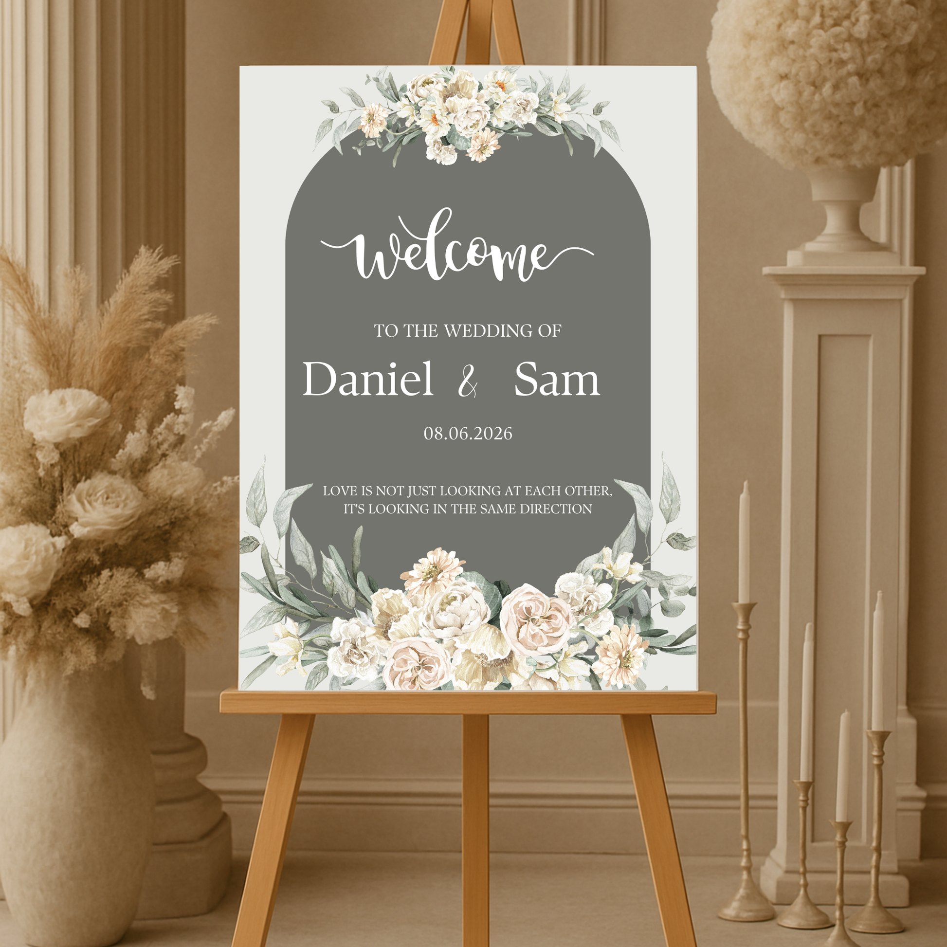 Elegant foam board wedding welcome sign with names Jessica & James DIGITAL POSTER, displayed on a gold easel at a romantic garden venue